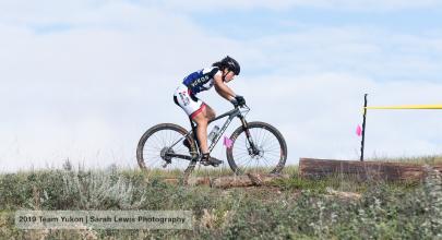 A Yukon mountain biker traverses the course. 