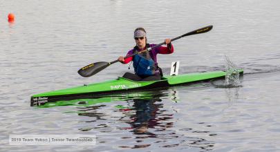 A kayaker nears the finish of their race. 