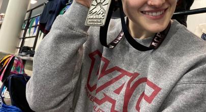 Hannah Kingscote shows off a silver medal won at BC Provincials.