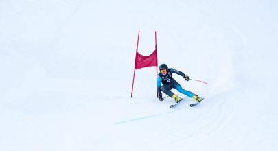 An alpine skier speeds down Mount Sima. 