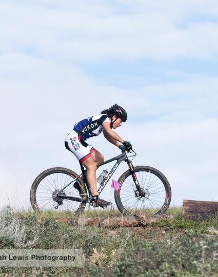 A Yukon mountain biker traverses the course. 