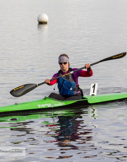 A kayaker nears the finish of their race. 